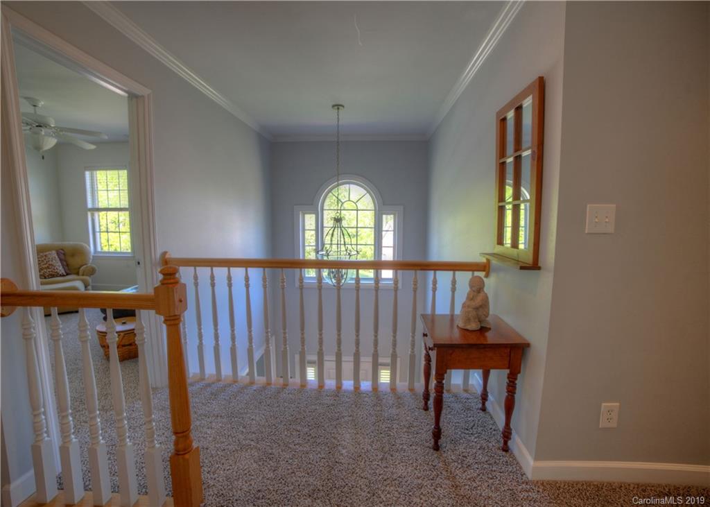 929 Ashford Way, Unit 79 Fort Mill, SC 29708 - Photo 17 of 39 a view of entryway and wooden floor