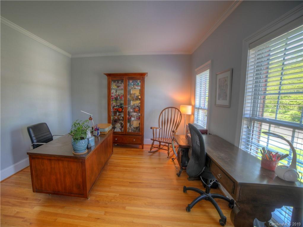 929 Ashford Way, Unit 79 Fort Mill, SC 29708 - Photo 28 of 39 a living room with furniture rug and a window