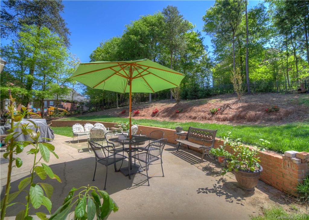 929 Ashford Way, Unit 79 Fort Mill, SC 29708 - Photo 32 of 39 a view of backyard with outdoor seating and green space