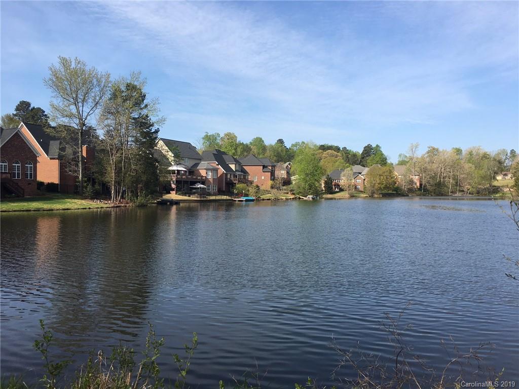 929 Ashford Way, Unit 79 Fort Mill, SC 29708 - Photo 34 of 39 a view of lake with houses