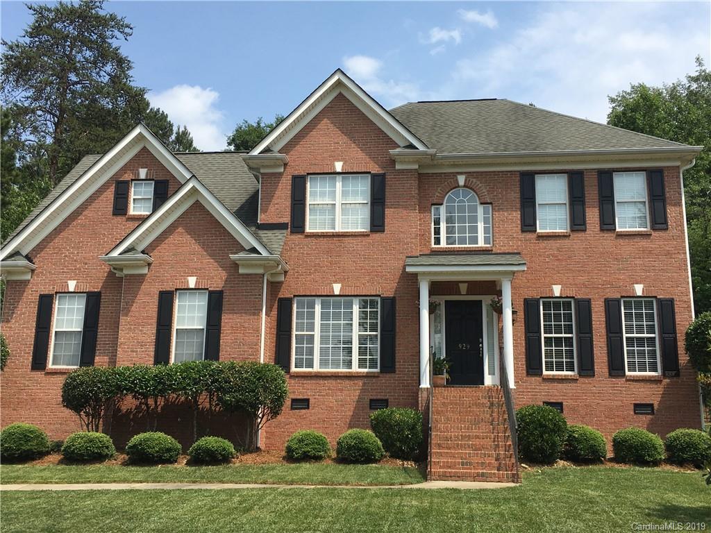 929 Ashford Way, Unit 79 Fort Mill, SC 29708 - Photo 37 of 39 front view of a house with a yard