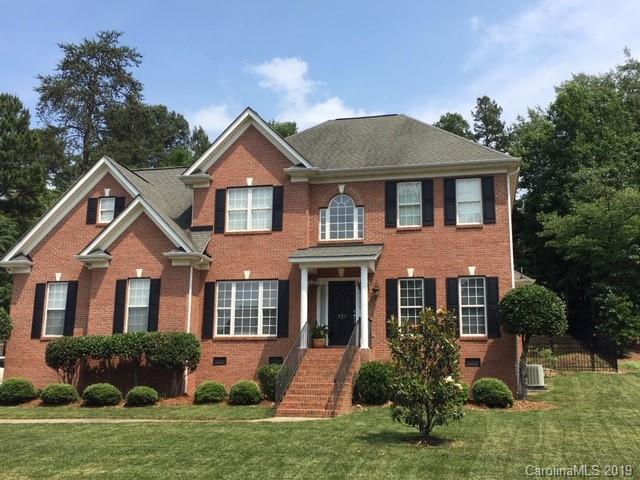 929 Ashford Way, Unit 79 Fort Mill, SC 29708 - Photo 38 of 39 front view of brick house with a yard