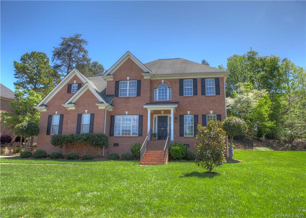929 Ashford Way, Unit 79 Fort Mill, SC 29708 - Photo 39 of 39 a front view of a house with garden