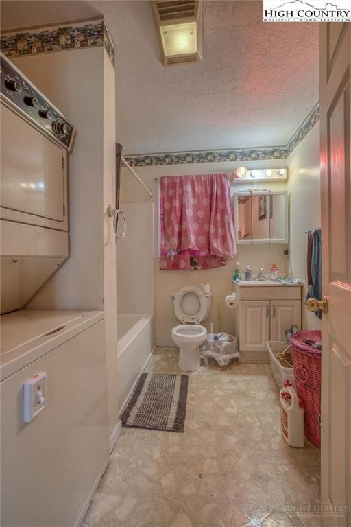 344-348 Tumbling Brook Road Banner Elk, NC 28604 - Photo 14 of 35 a bathroom with a sink a toilet and shower