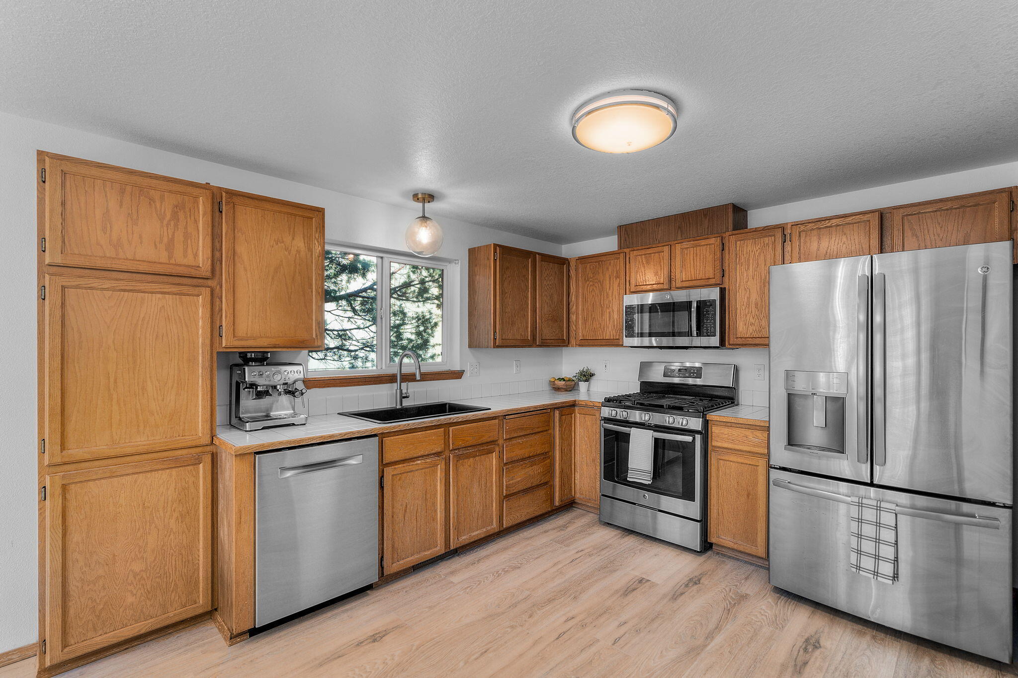 3173 Northeast Manchester Avenue Bend, OR 97701 - Photo 13 of 30 2024_05_21_manchester_kitchen-3