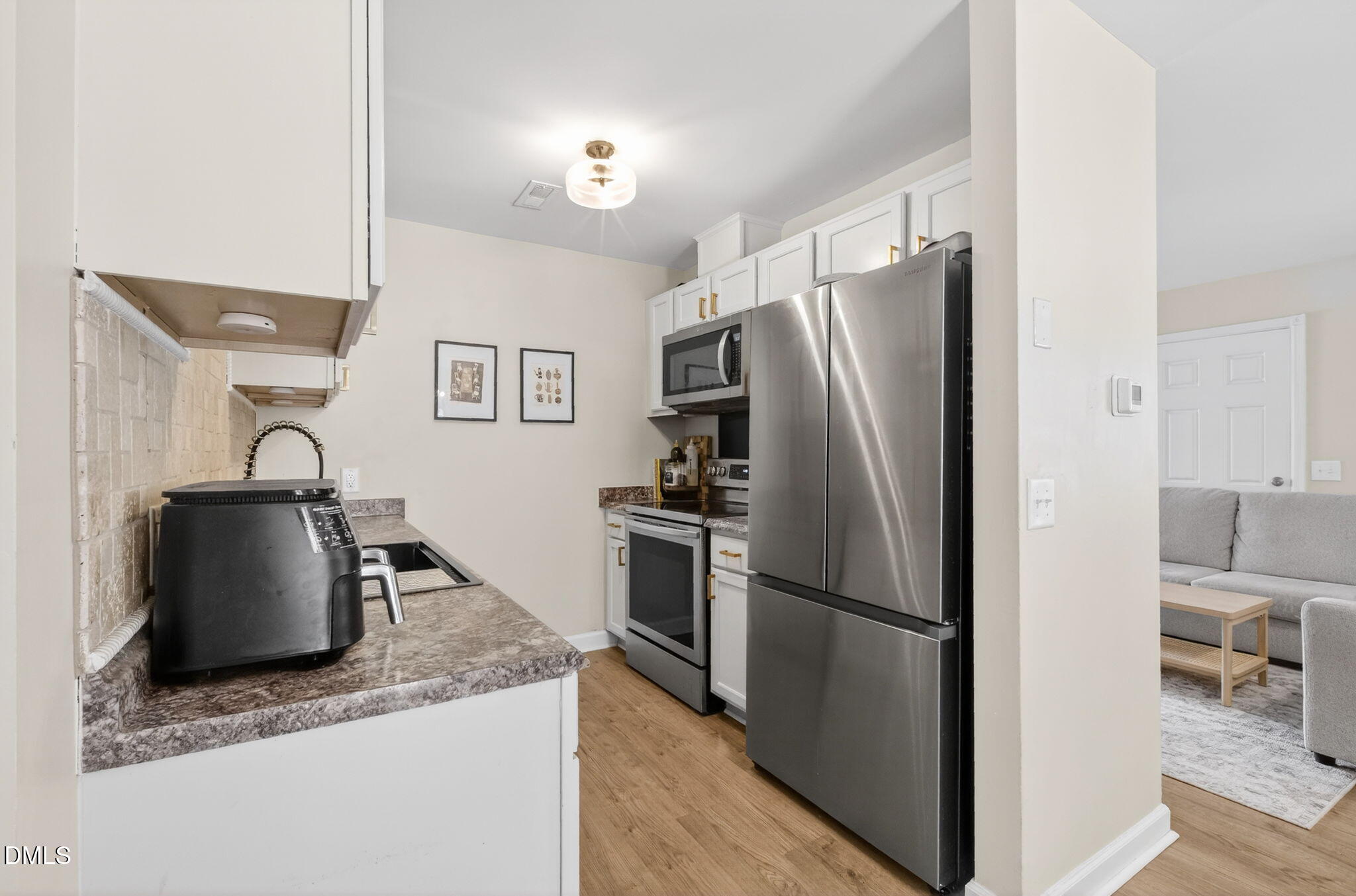 2708 Plainsfield Circle Raleigh, NC 27610 - Photo 6 of 35