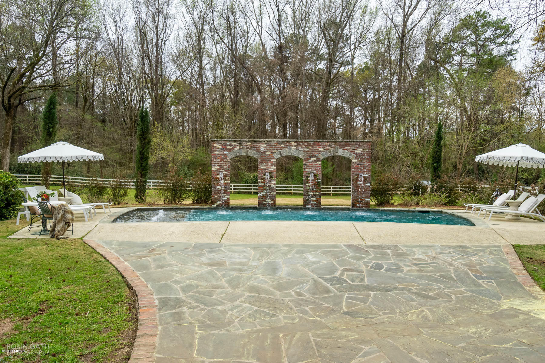 6150 Old Forsyth Road Macon, GA 31210 - Photo 15 of 50 a view of a swimming pool with a patio