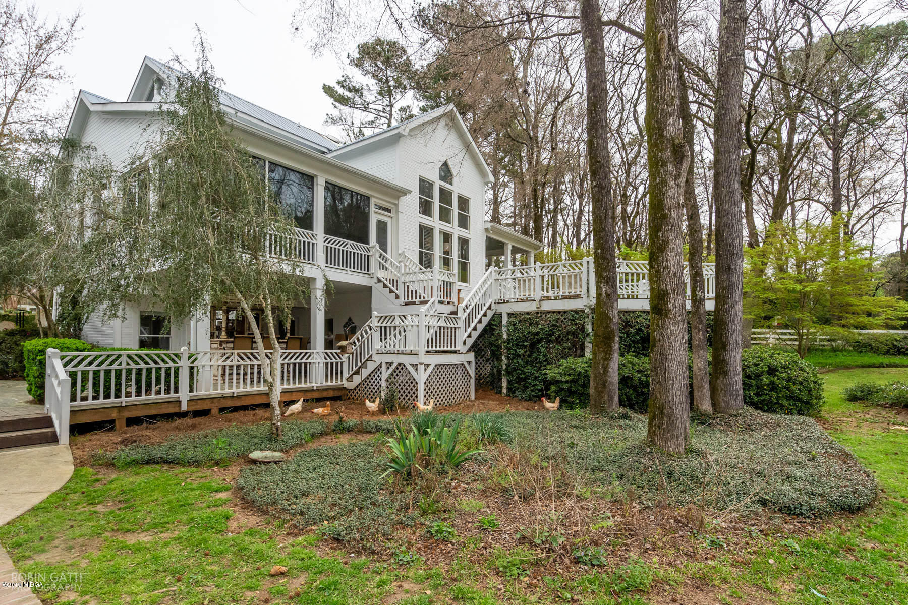 6150 Old Forsyth Road Macon, GA 31210 - Photo 16 of 50 a view of a house with backyard and a tree