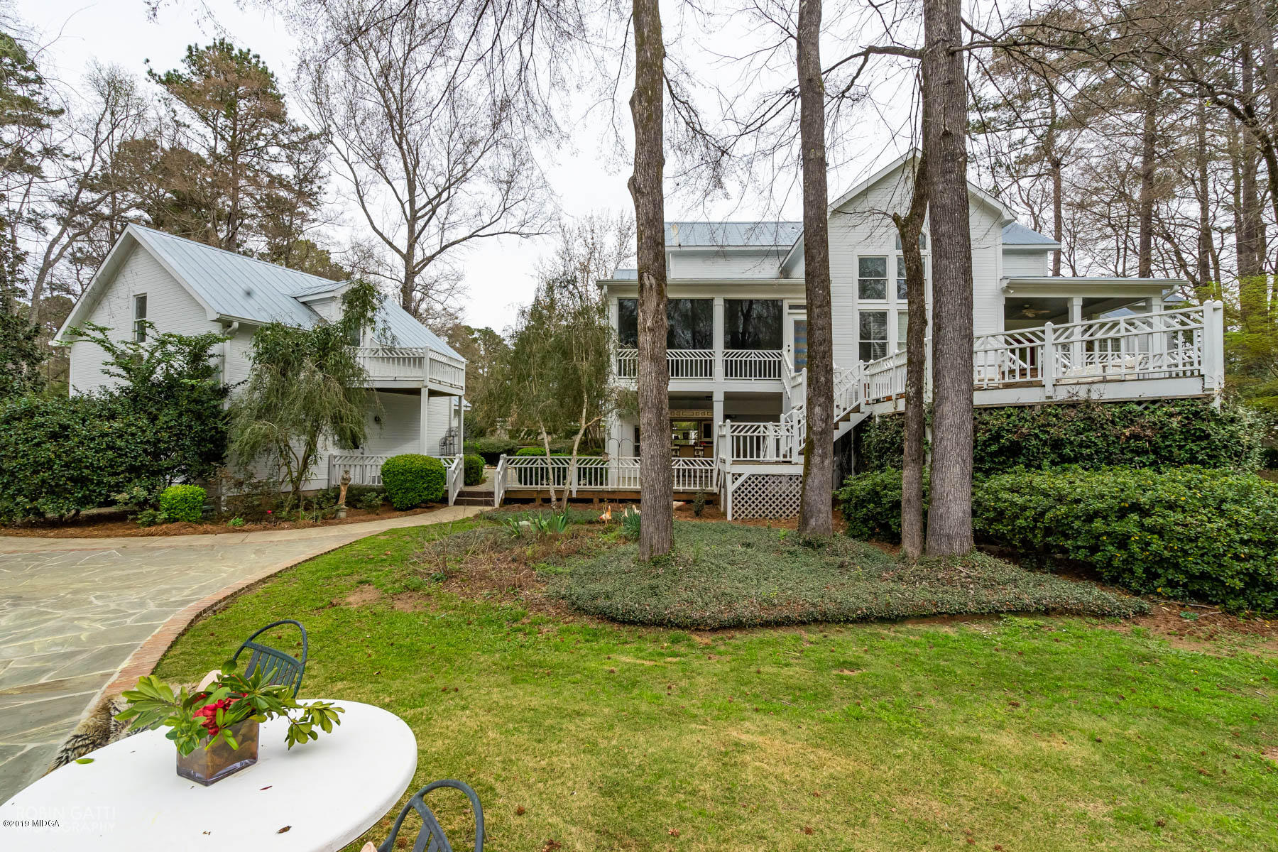 6150 Old Forsyth Road Macon, GA 31210 - Photo 19 of 50 a view of a house with backyard and sitting area