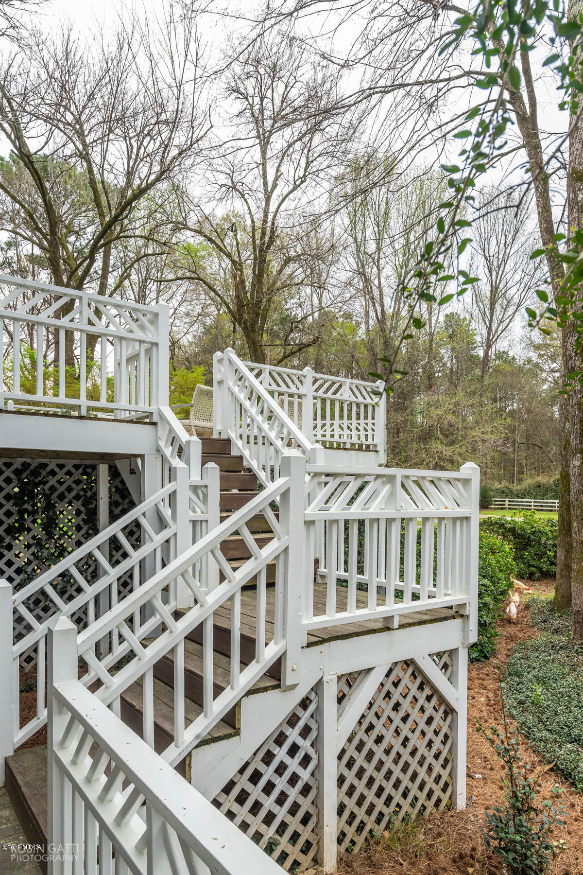 6150 Old Forsyth Road Macon, GA 31210 - Photo 24 of 50 front view of a house with a street