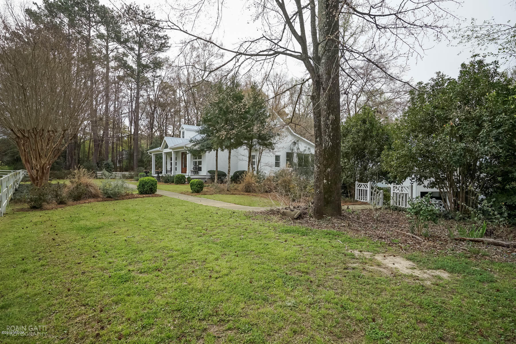 6150 Old Forsyth Road Macon, GA 31210 - Photo 4 of 50 a view of a yard with palm trees
