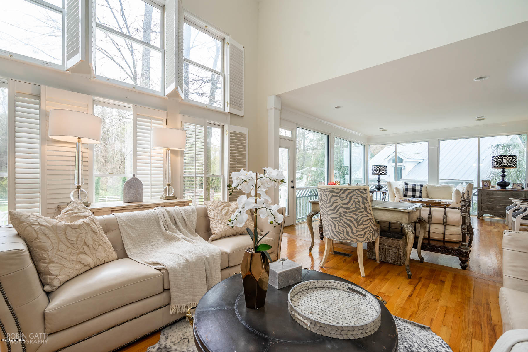 6150 Old Forsyth Road Macon, GA 31210 - Photo 31 of 50 a living room with furniture a large window and dining table