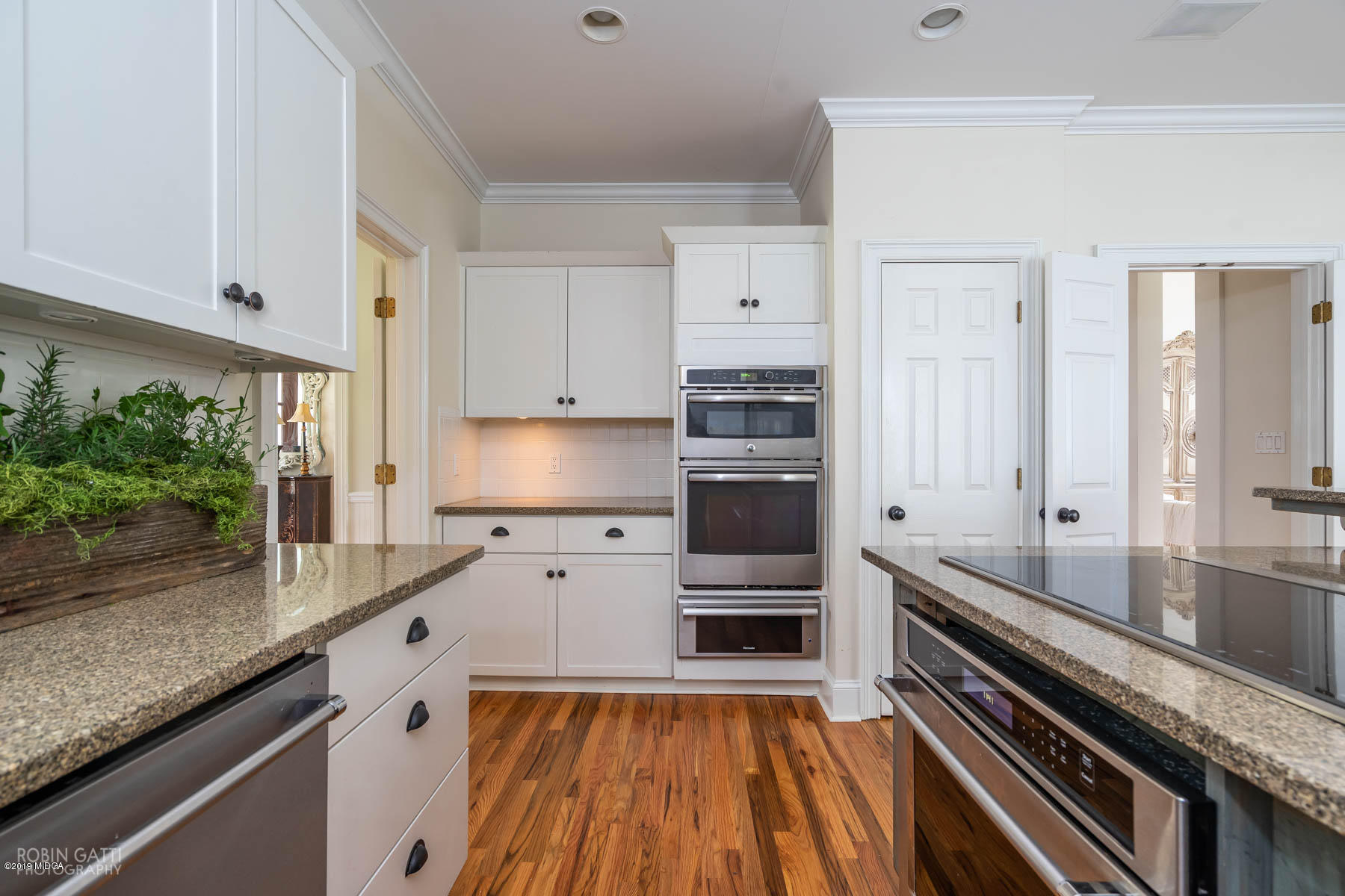 6150 Old Forsyth Road Macon, GA 31210 - Photo 36 of 50 a kitchen with stainless steel appliances a sink stove and cabinets