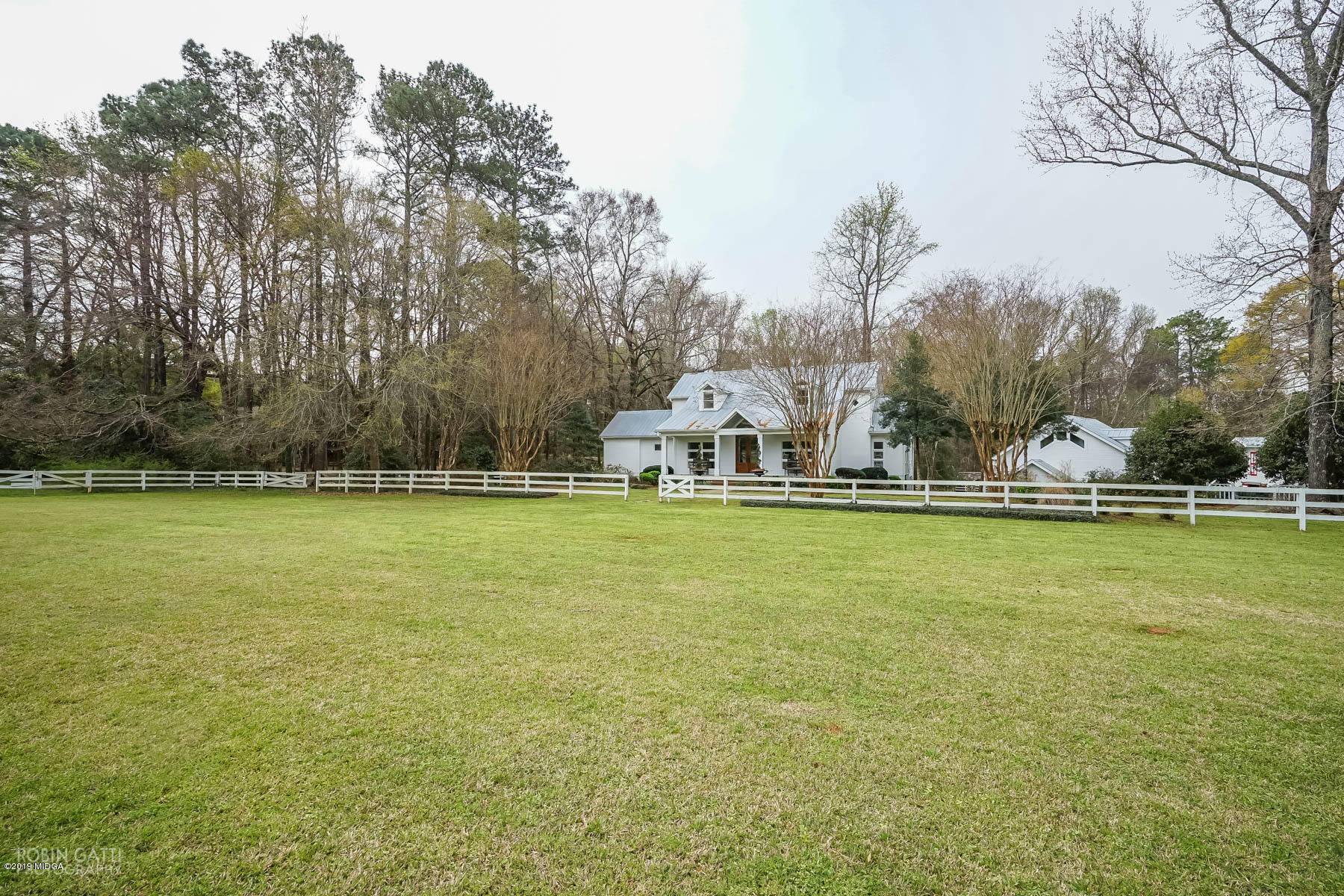 6150 Old Forsyth Road Macon, GA 31210 - Photo 5 of 50 a view of a lake with houses