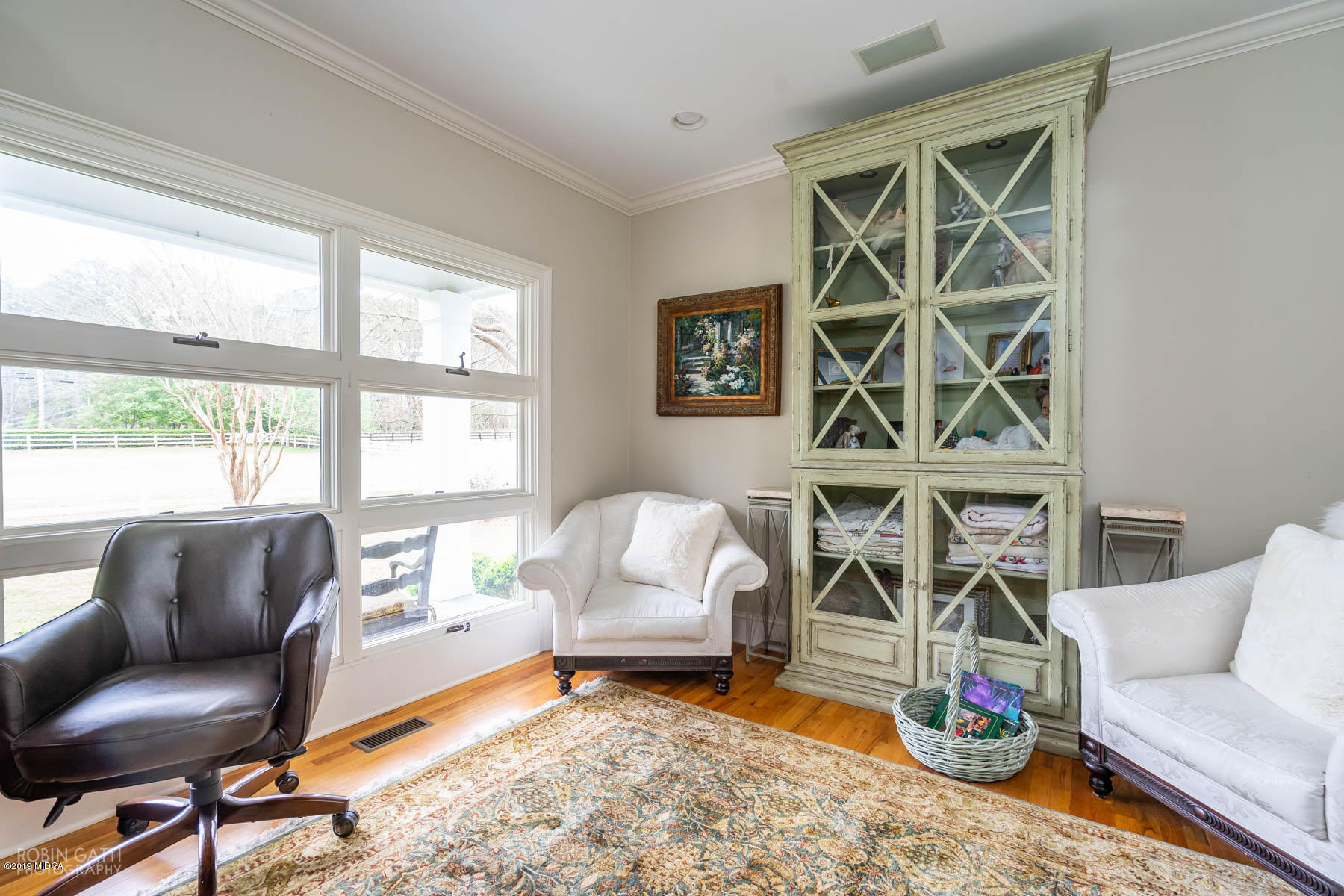 6150 Old Forsyth Road Macon, GA 31210 - Photo 42 of 50 a living room with a couch and a table