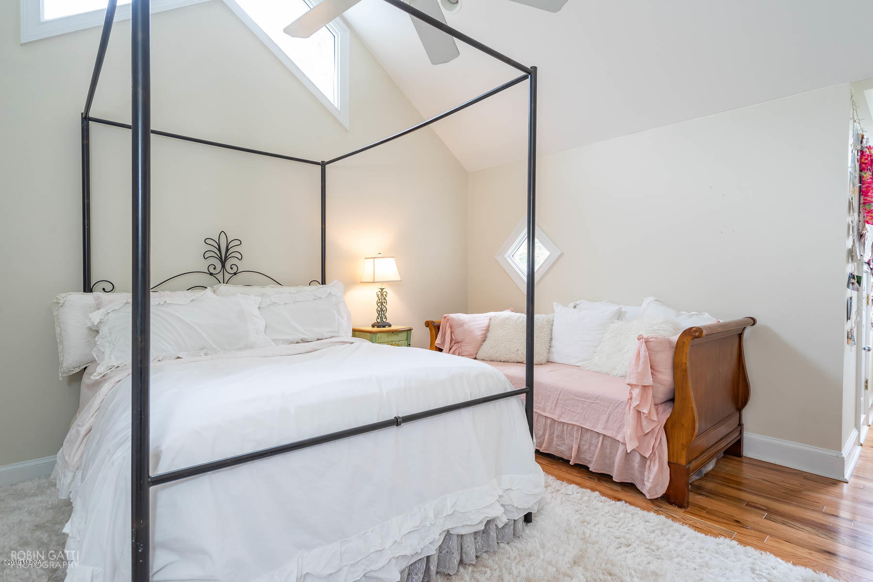 6150 Old Forsyth Road Macon, GA 31210 - Photo 46 of 50 a bedroom with a bed lamp and a mirror