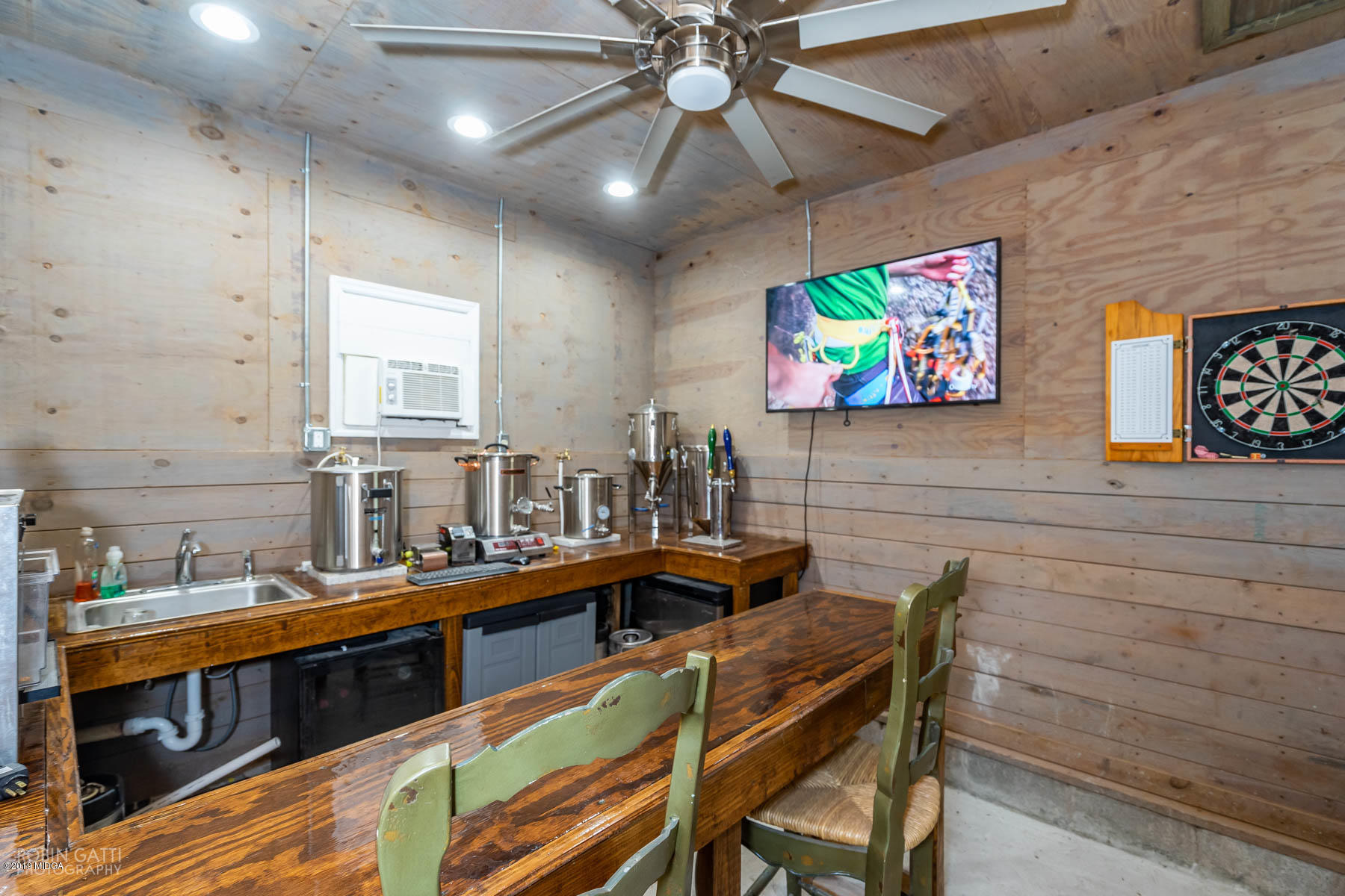 6150 Old Forsyth Road Macon, GA 31210 - Photo 49 of 50 a kitchen with stainless steel appliances cabinets and a table