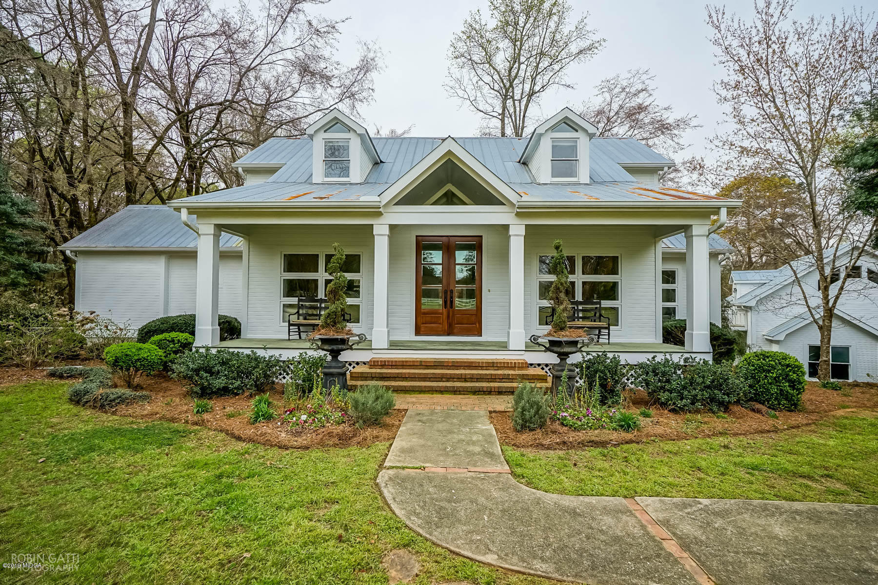 6150 Old Forsyth Road Macon, GA 31210 - Photo 7 of 50 front view of a house with a yard