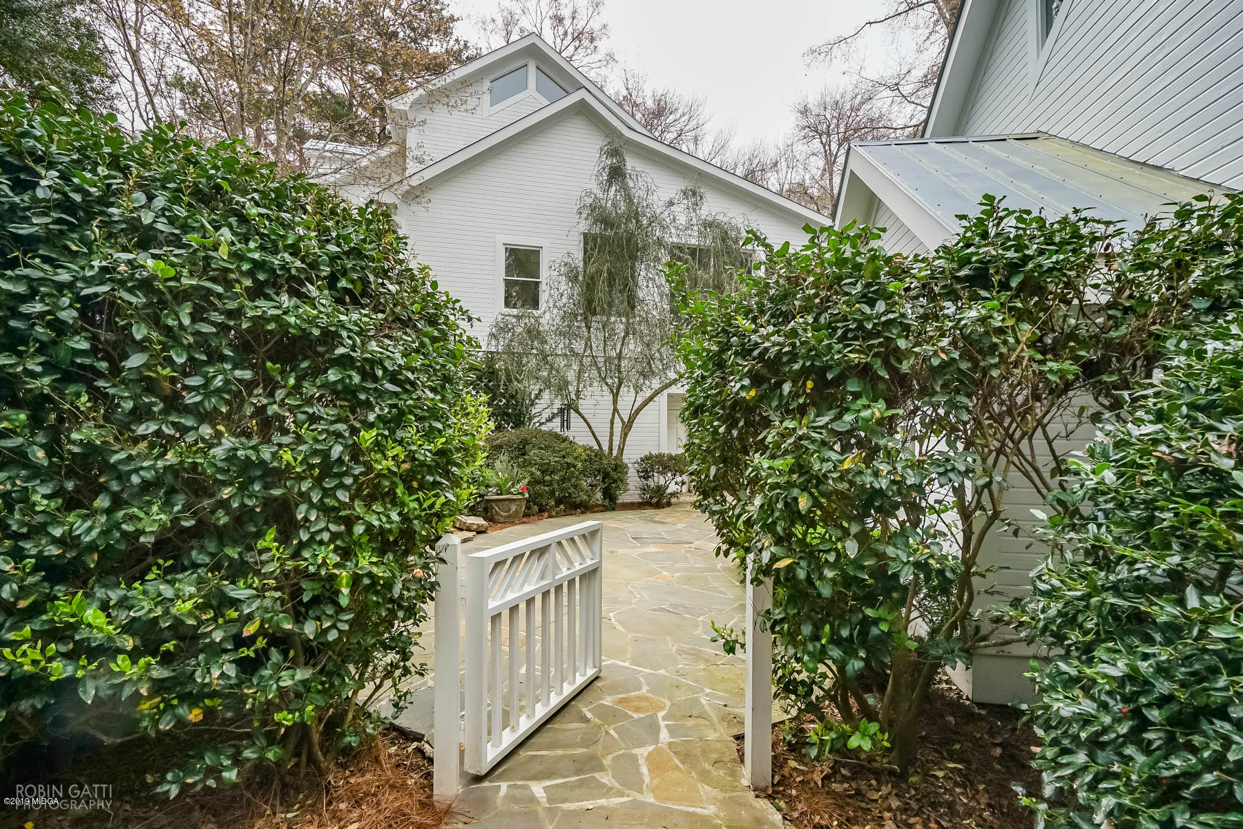 6150 Old Forsyth Road Macon, GA 31210 - Photo 9 of 50 a view of a house with a tree