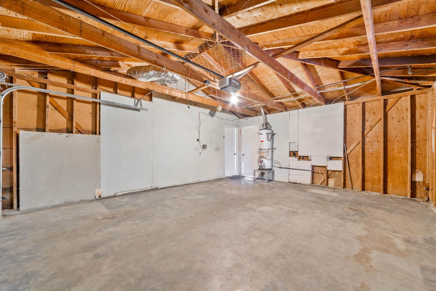 25612 Walden Avenue Madera, CA 93638 - Photo 11 of 33 a view of a room with wooden walls