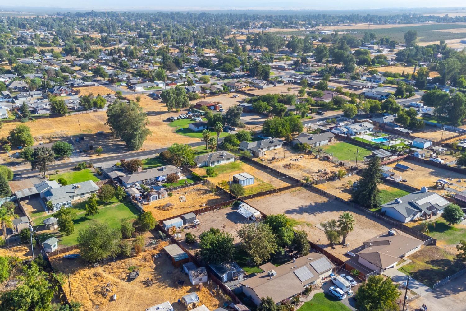 25612 Walden Avenue Madera, CA 93638 - Photo 32 of 33 an aerial view of residential houses with outdoor space