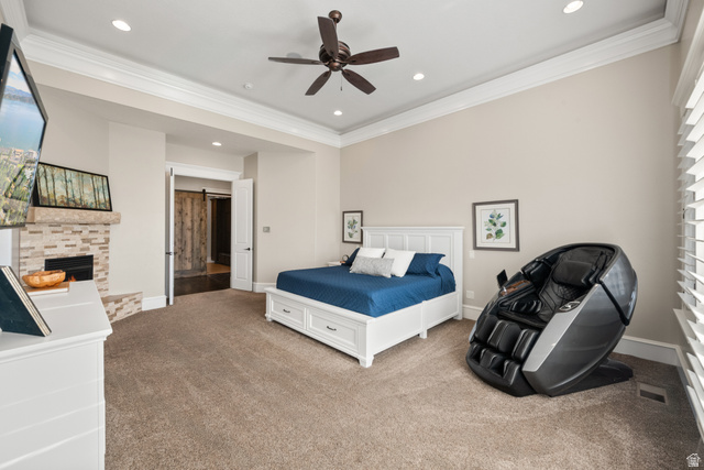 1205 North Elk Rdg Lane, Unit 202 Alpine, UT 84004 - Photo 26 of 88 Spacious room featuring tray ceiling, recessed lighting, fireplace with stone surround, and carpet flooring