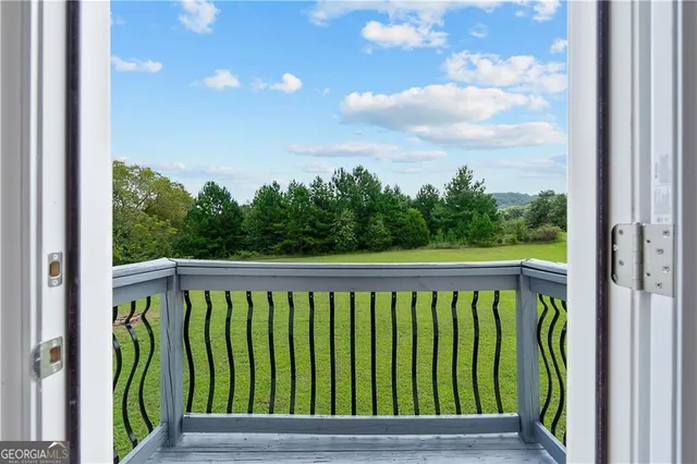 a view of a balcony with outdoor space