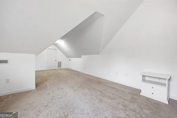 a view of an entryway with staircase