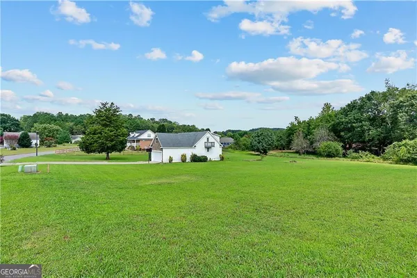 a house view with a garden space