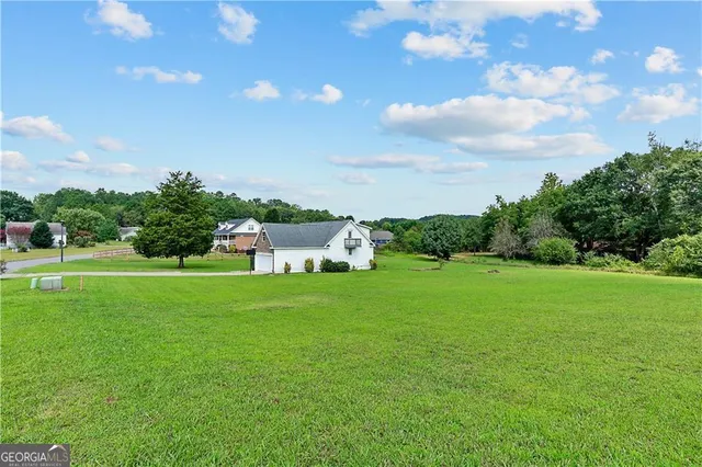 a house view with a garden space