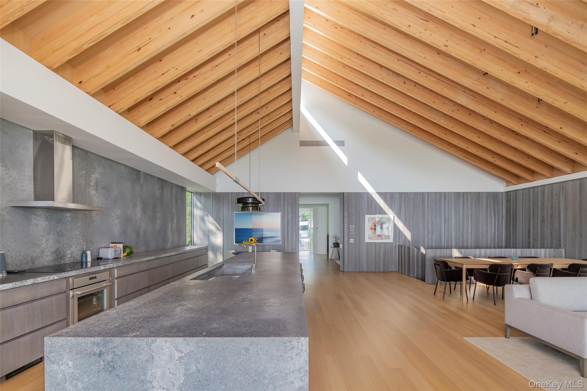 47 L South Ferry Road Shelter Island, NY 11964 - Photo 17 of 38 a kitchen with furniture and wooden floors