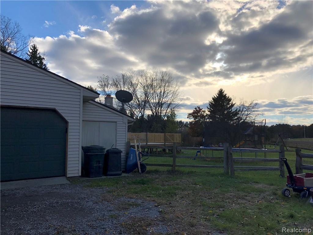 9579 Oak Grove Road Howell, MI 48855 - Photo 32 of 33 gar yard.jpeg