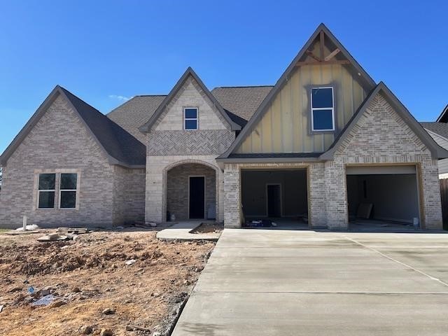 1335 Natashas Way Lumberton, TX 77657 - Photo 1 of 7 a front view of a house with a yard