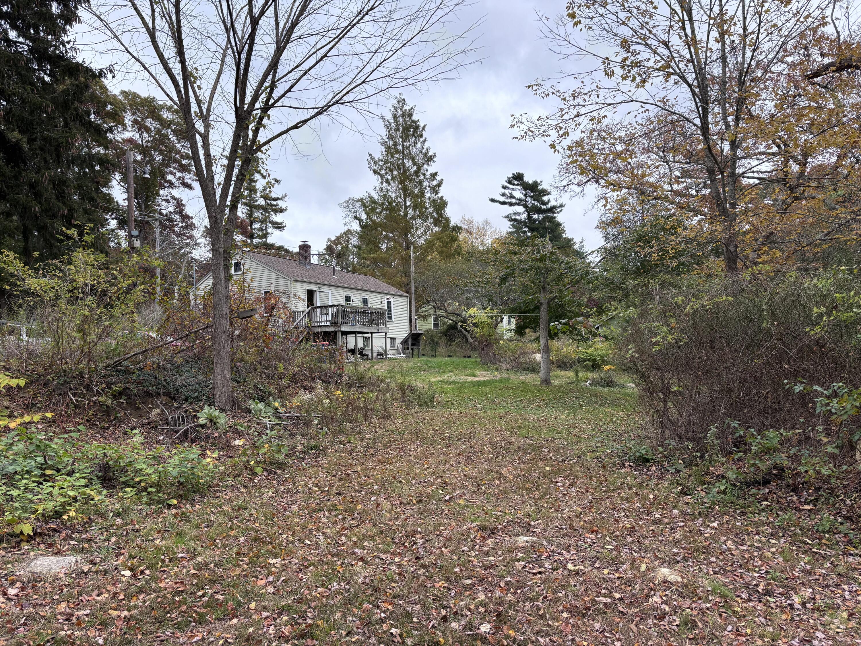 722 Main Street Wareham, MA 02571 - Photo 11 of 16 a view of a house with a backyard