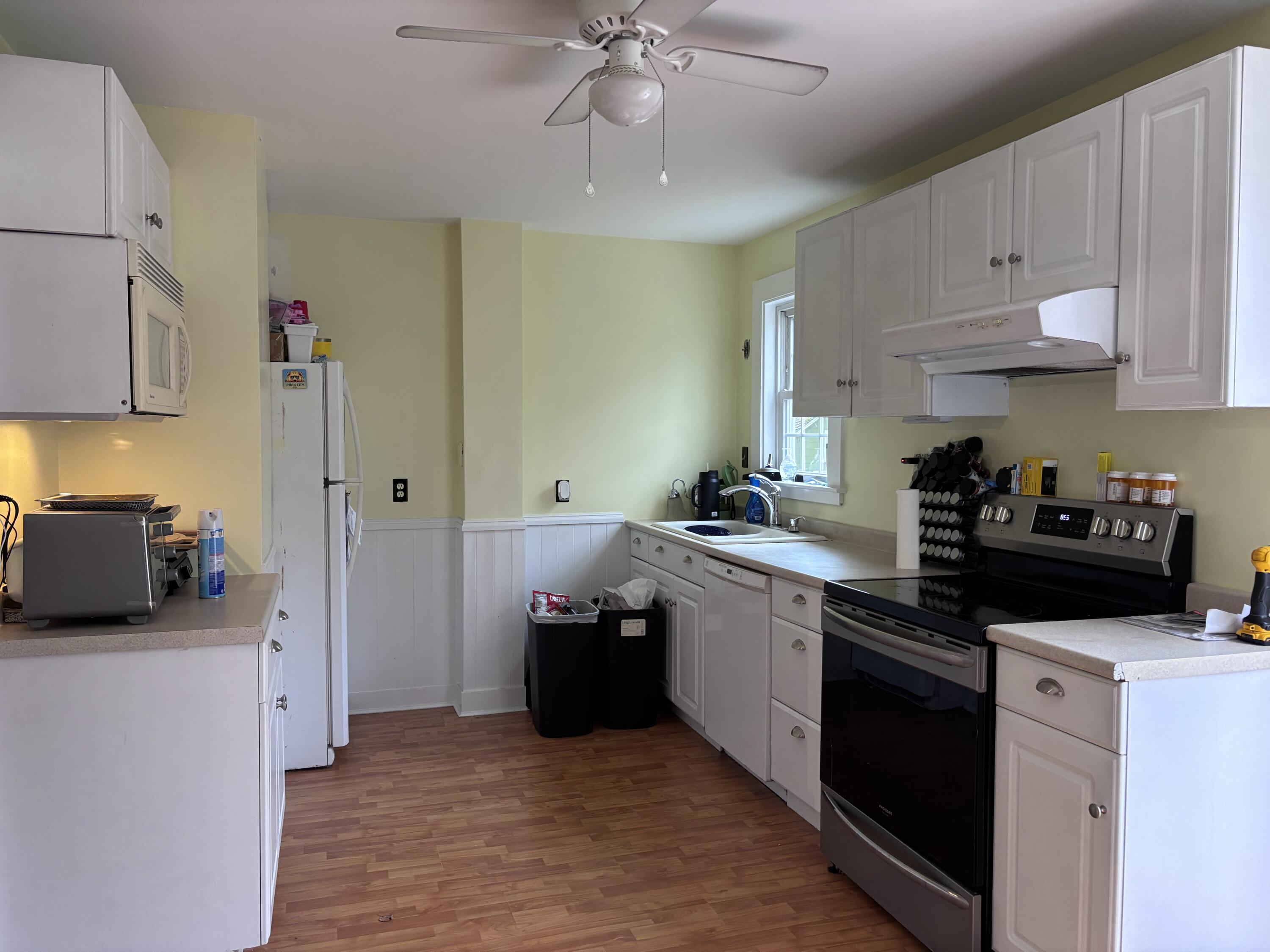 722 Main Street Wareham, MA 02571 - Photo 3 of 16 a kitchen with cabinets and stainless steel appliances