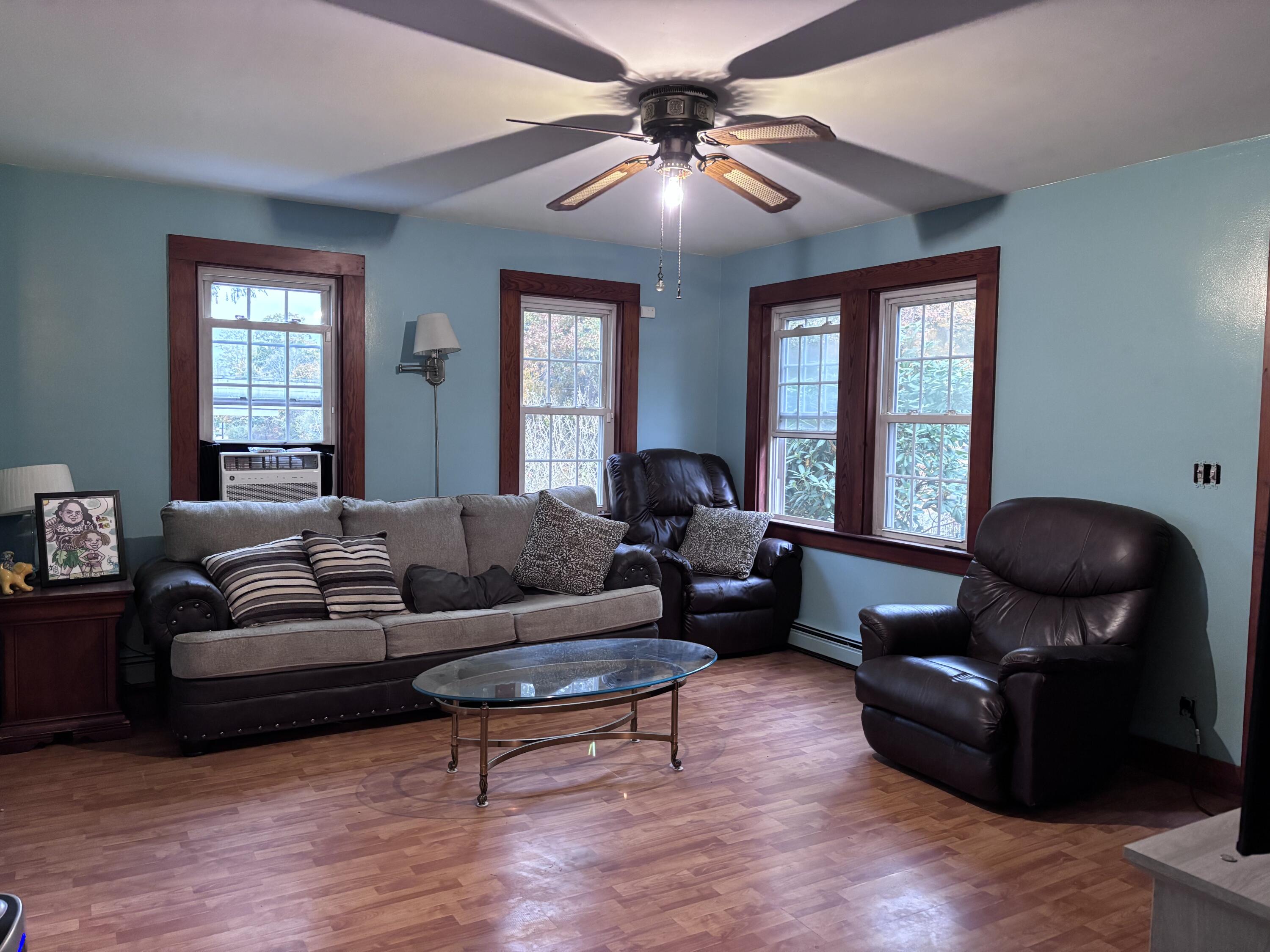 722 Main Street Wareham, MA 02571 - Photo 4 of 16 a living room with furniture and a window