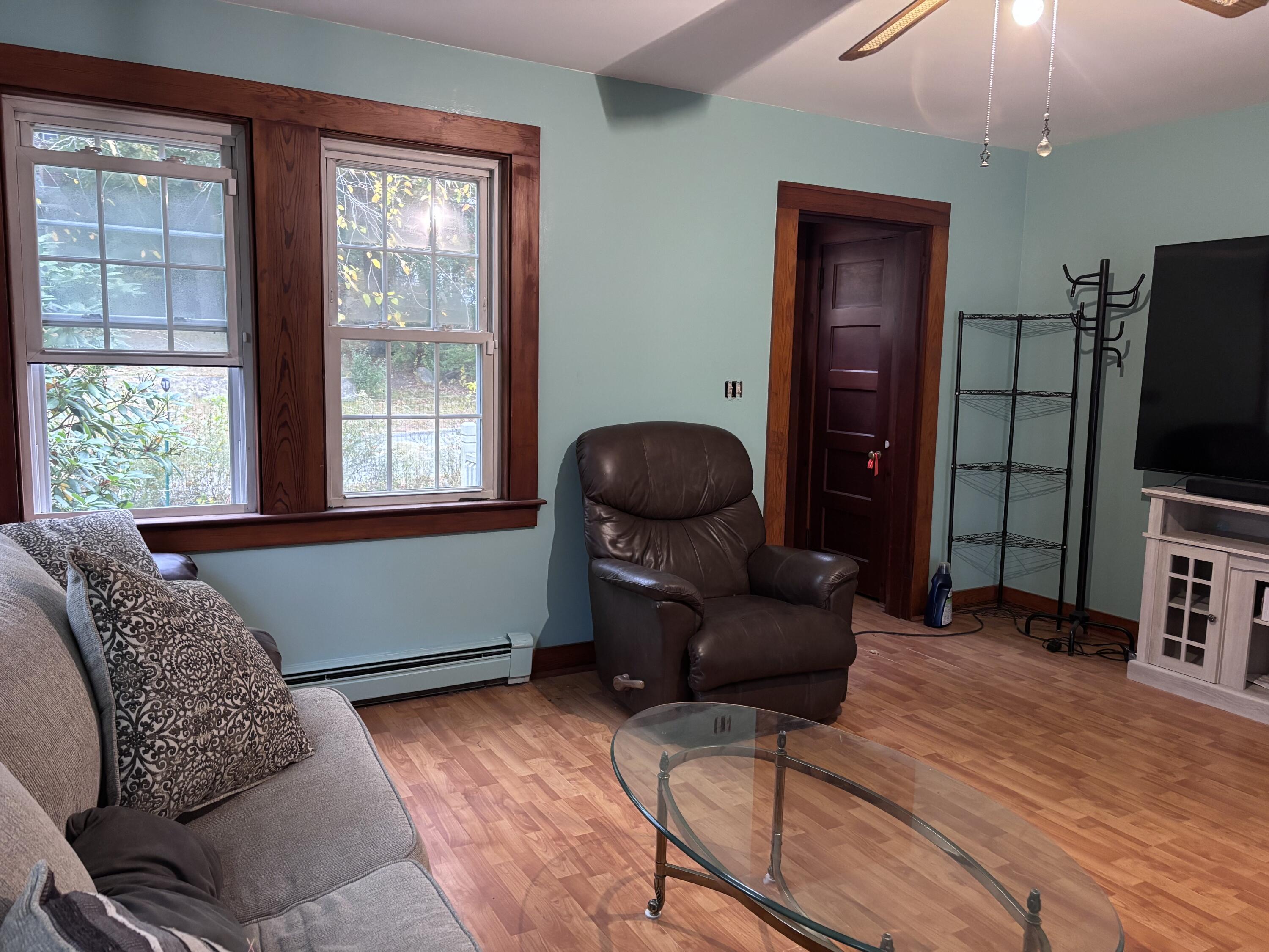 722 Main Street Wareham, MA 02571 - Photo 5 of 16 a livingroom with workspace and a window