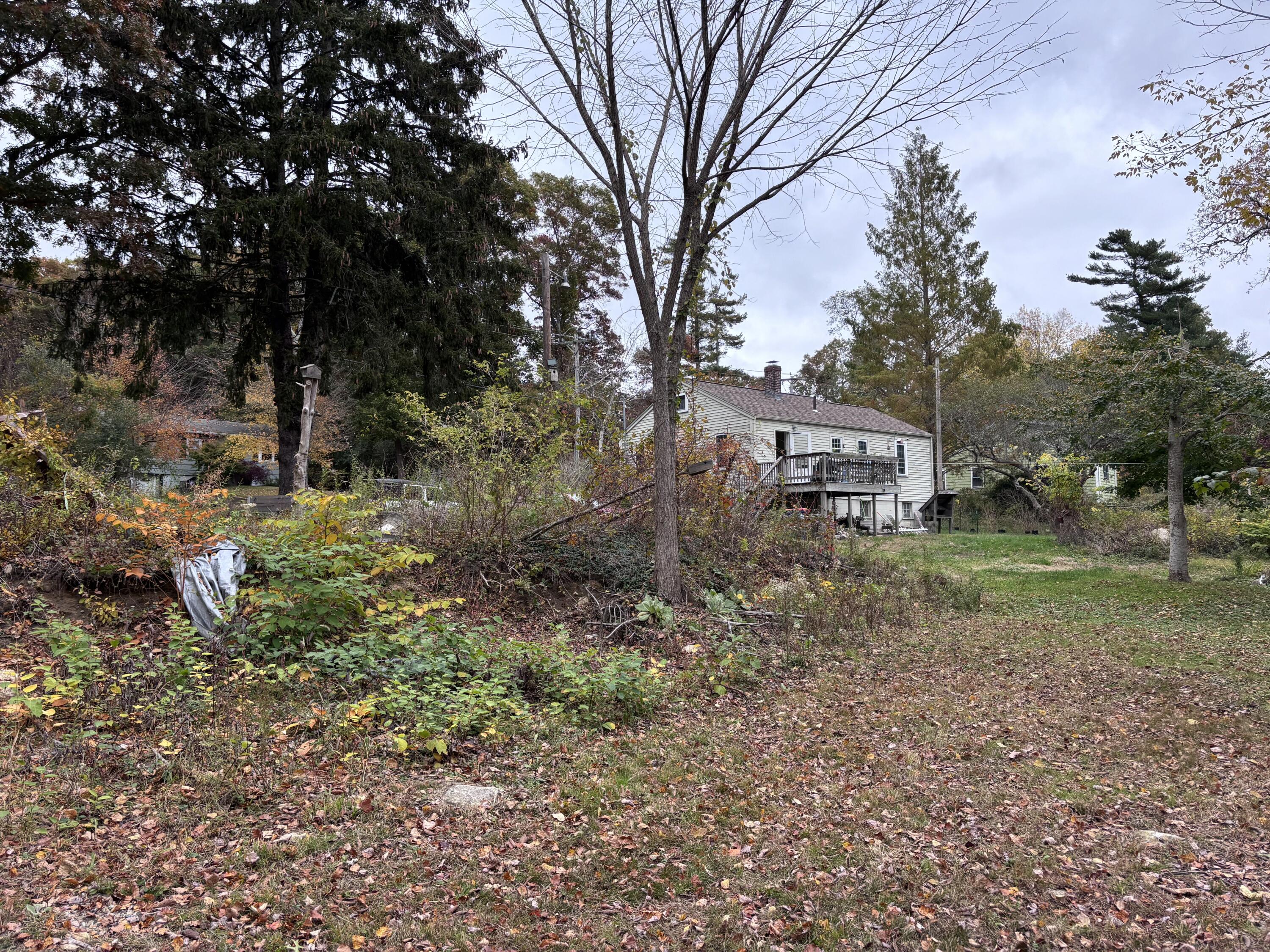 722 Main Street Wareham, MA 02571 - Photo 10 of 16 a backyard of a house with lots of green space
