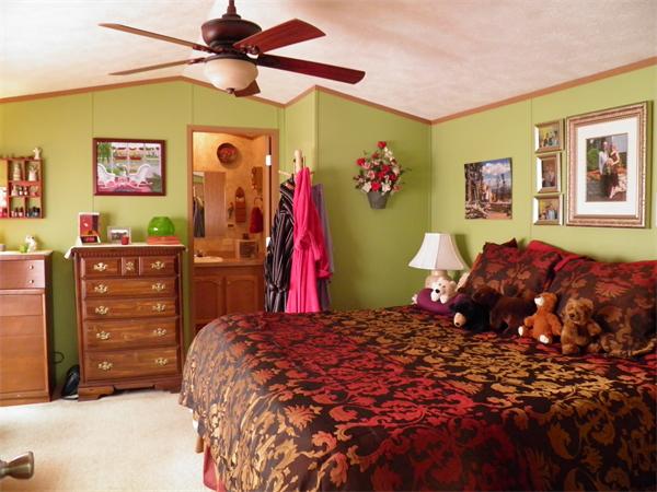 6 Palmer Road Three Rivers, MA 01080 - Photo 7 of 14 a bed room with a bed and a closet