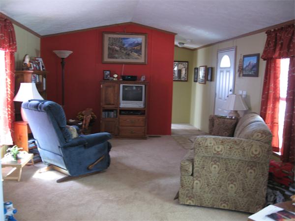 6 Palmer Road Three Rivers, MA 01080 - Photo 10 of 14 a living room with furniture and a flat screen tv