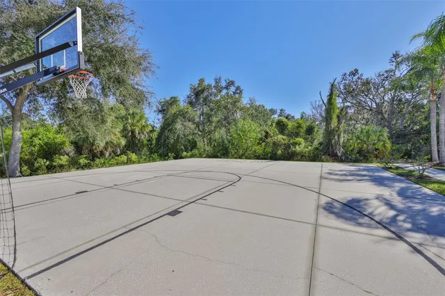 an aerial view of a house with a lake view
