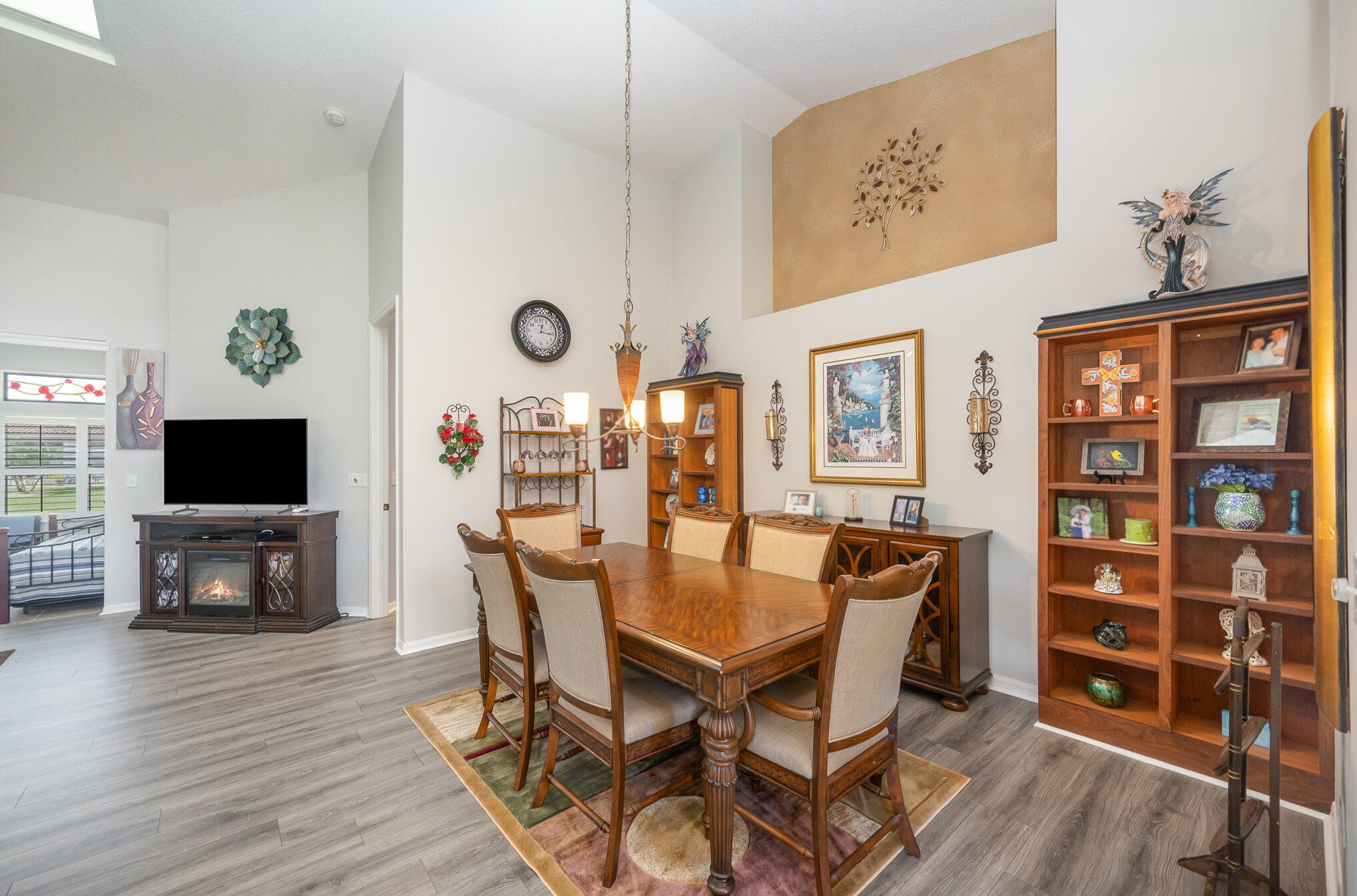 391 Shell Cove Drive Melbourne, FL 32940 - Photo 11 of 37 a view of a dining room with furniture window and wooden floor
