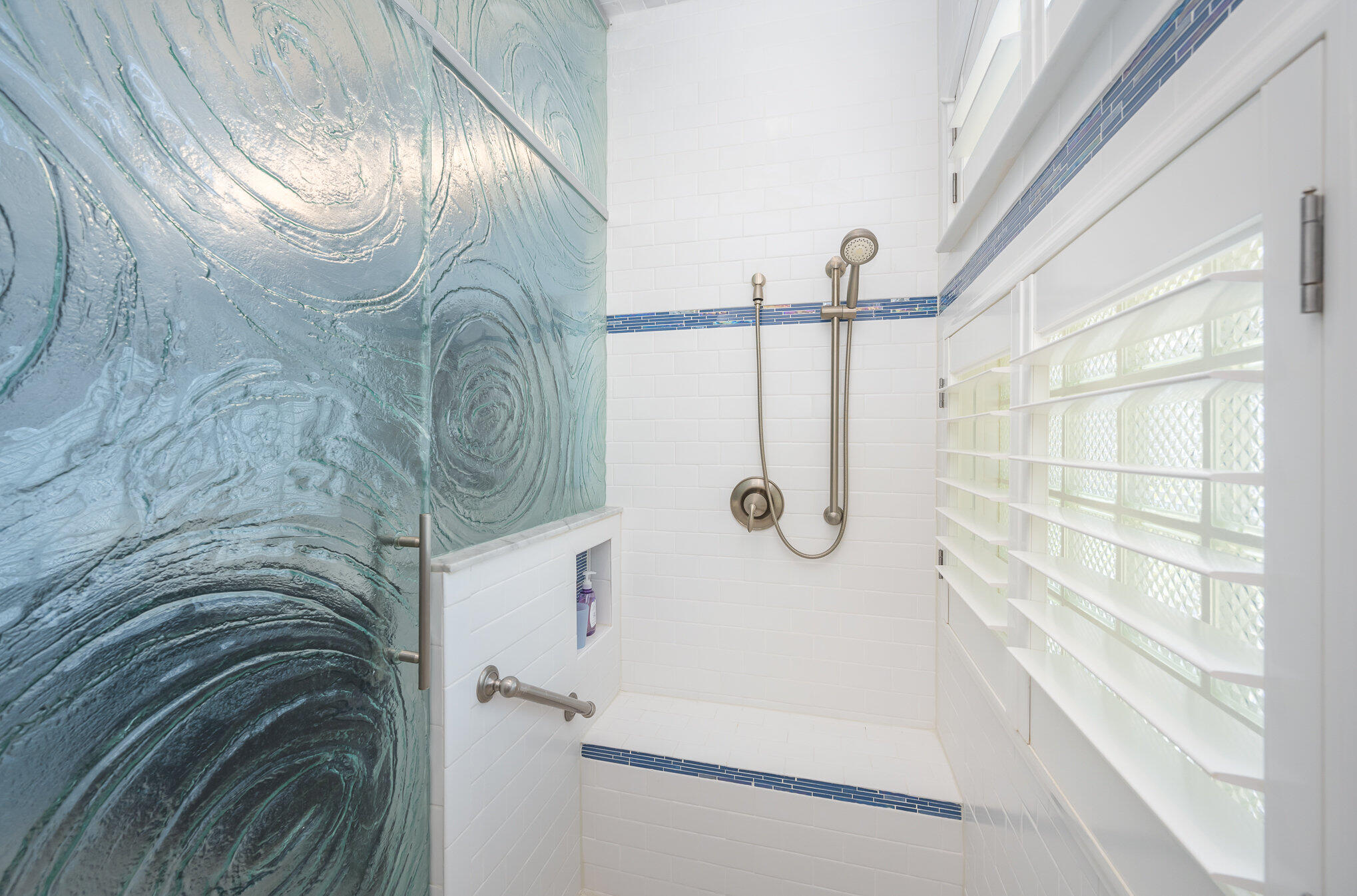 391 Shell Cove Drive Melbourne, FL 32940 - Photo 22 of 37 a bathroom with a sink and a shower
