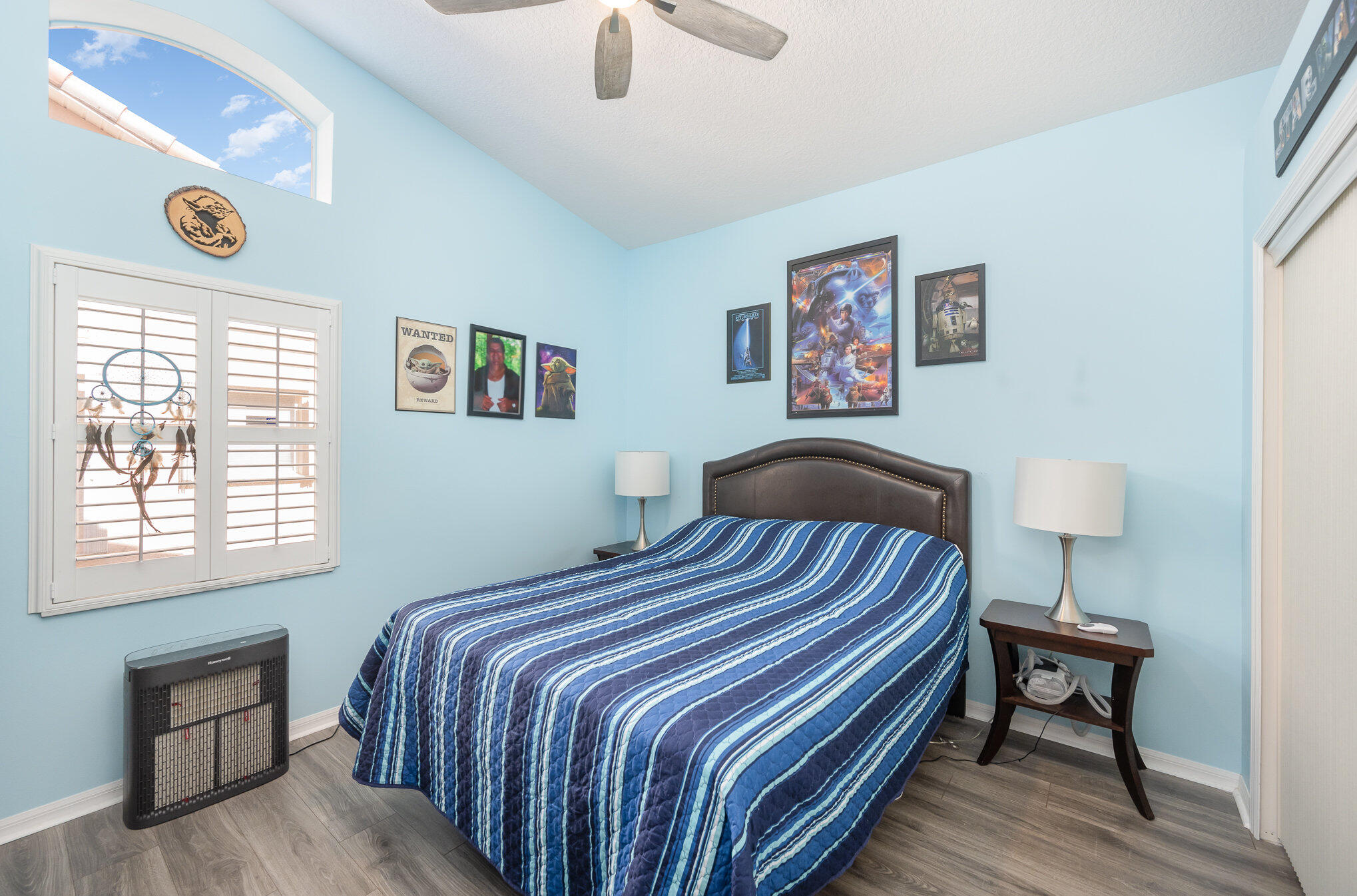 391 Shell Cove Drive Melbourne, FL 32940 - Photo 24 of 37 a bedroom with bed and a window