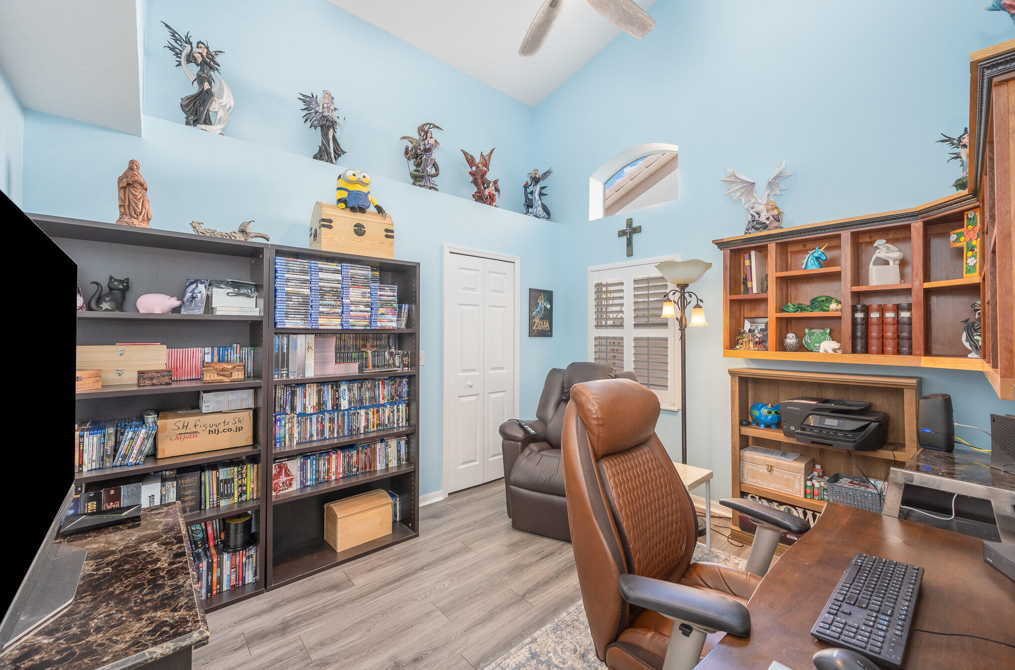 391 Shell Cove Drive Melbourne, FL 32940 - Photo 25 of 37 a workspace with furniture and wooden floor
