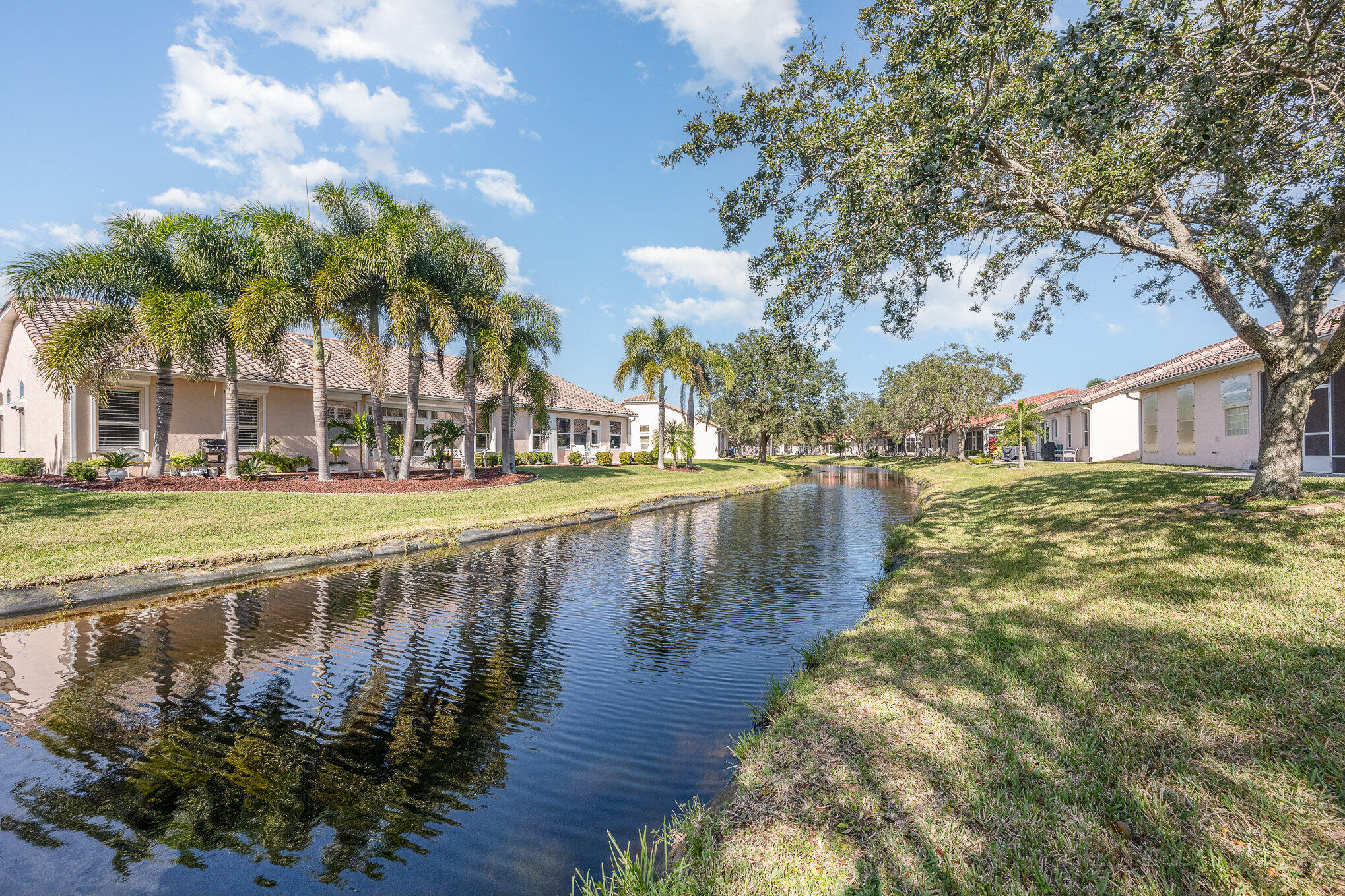 391 Shell Cove Drive Melbourne, FL 32940 - Photo 33 of 37 a swimming pool view with a lake view