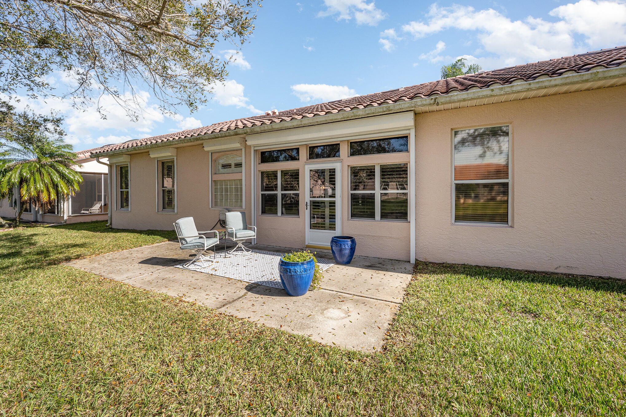 391 Shell Cove Drive Melbourne, FL 32940 - Photo 35 of 37 a front view of a house with a patio