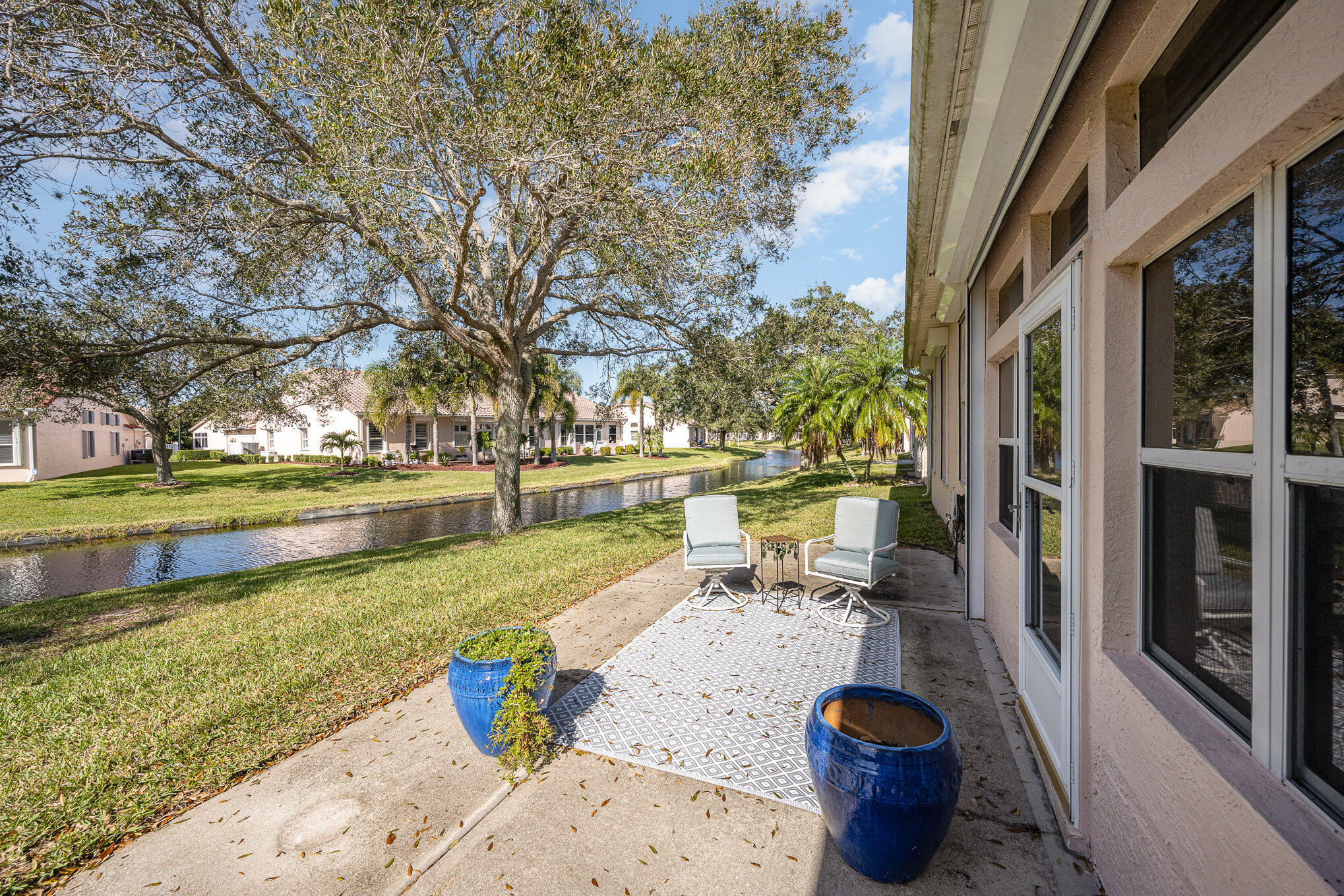 391 Shell Cove Drive Melbourne, FL 32940 - Photo 36 of 37 a view of a swimming pool with a patio