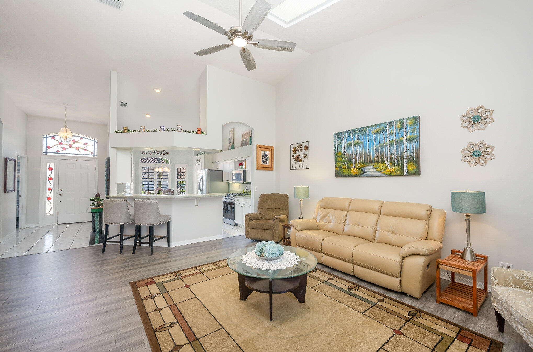 391 Shell Cove Drive Melbourne, FL 32940 - Photo 8 of 37 a living room with furniture and kitchen view