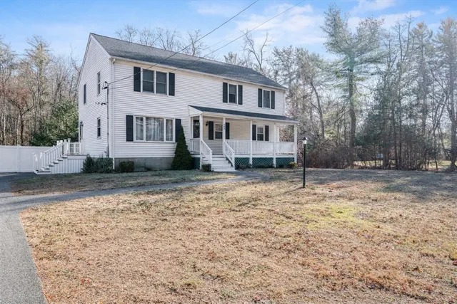 a kitchen with a table and chairs in it